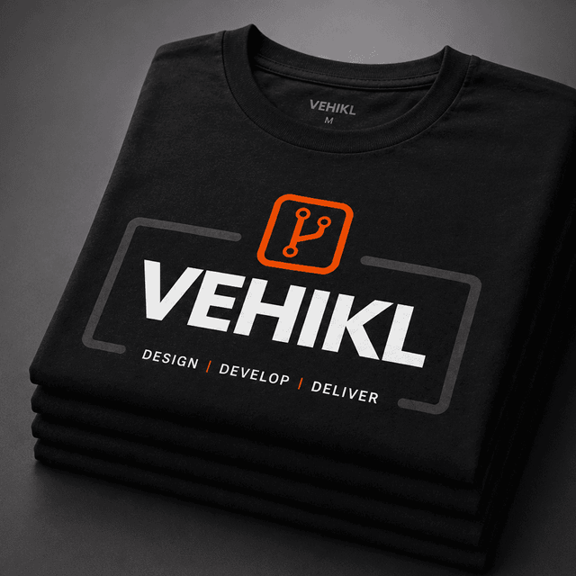 Stack of black Vehikl T-shirts